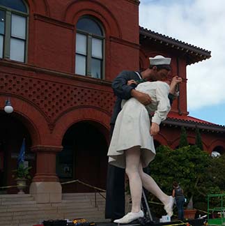 sailor and girl in front of Customs House art & history museum