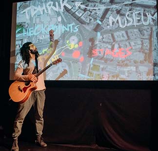 Ramy showing map of the square