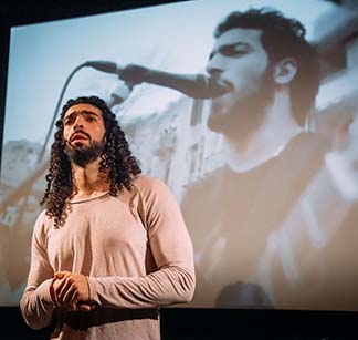 Ramy singing at protest