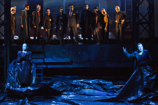 Citizens confront Valerie Dashwood as Death and Serge Maggiani as The Plague
